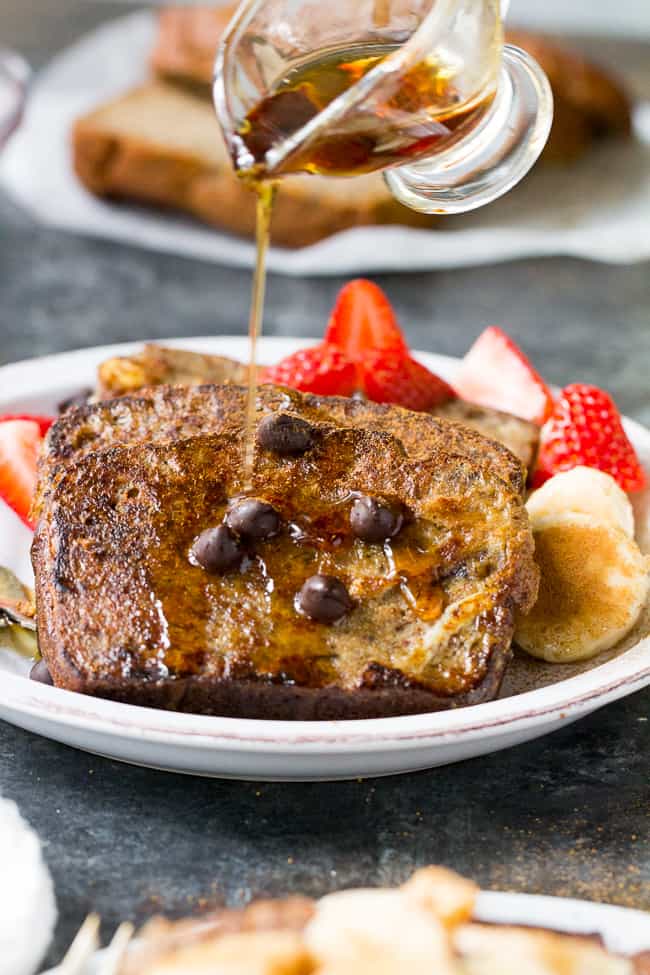 This Banana Bread French Toast is pure paleo breakfast comfort food!  Made with a hearty banana-sweetened grain free and paleo banana bread, it's perfect for a weekend breakfast treat when you're craving something indulgent.  Gluten free, dairy free, refined-sugar free.