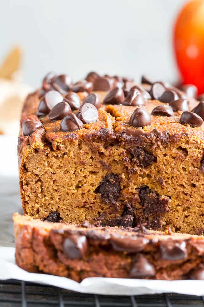 This paleo pumpkin bread is perfectly soft, tender, moist and full of sweet spices and dark chocolate chips.  It's made with coconut flour, grain free, dairy free and nut free.  Kid approved too and great for after school snacks and even breakfast!