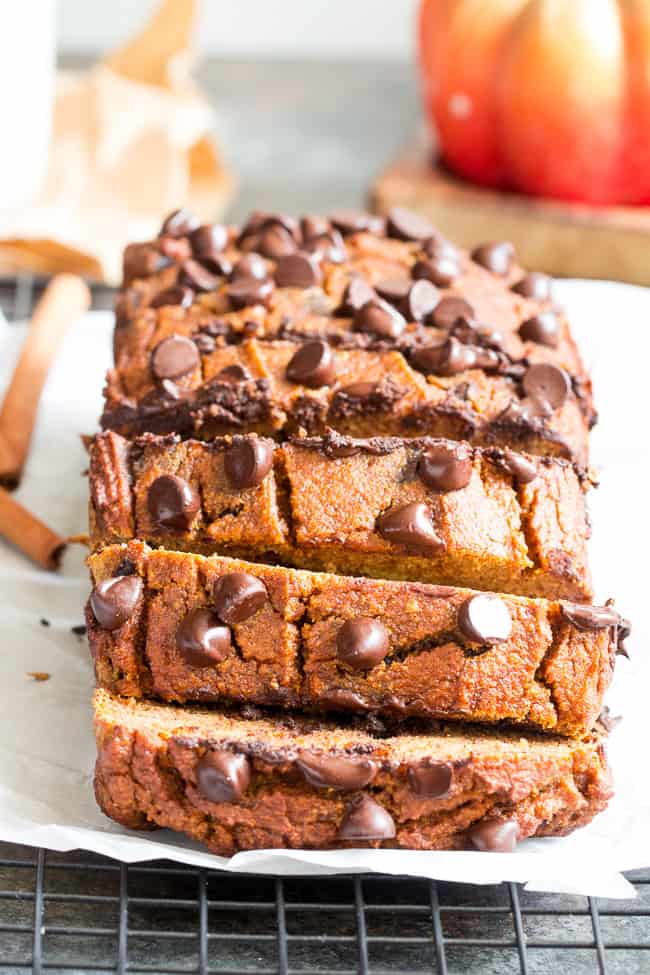 This paleo pumpkin bread is perfectly soft, tender, moist and full of sweet spices and dark chocolate chips.  It's made with coconut flour, grain free, dairy free and nut free.  Kid approved too and great for after school snacks and even breakfast!