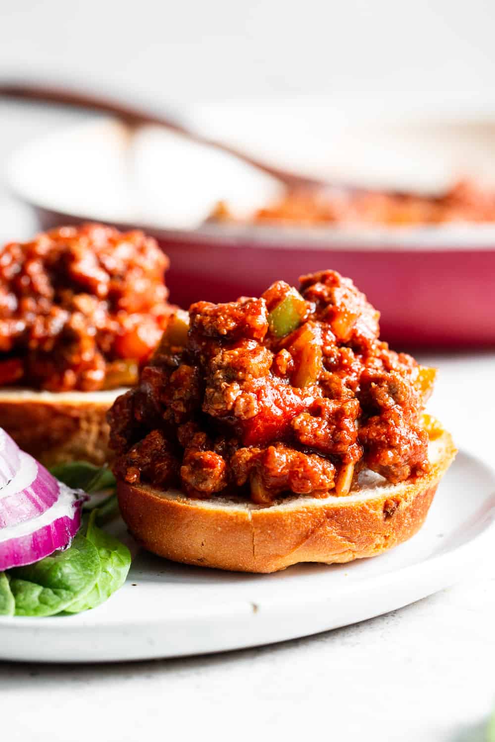 hese Paleo sloppy joes are classic comfort food made without the junk! The sauce is date sweetened to make it Whole30, and it's quick and easy enough for weeknight dinners.  Family approved and makes great leftovers, too!  Serve on paleo rolls or on sweet potato "buns"! #paleo #cleaneating 