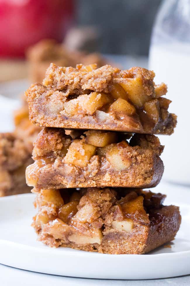 These Paleo apple pie bars have a delicious almond butter crust and crumb top and perfect apple pie filling! They're a fun fall dessert to make and eat with kids, gluten-free, dairy-free, paleo and vegan.