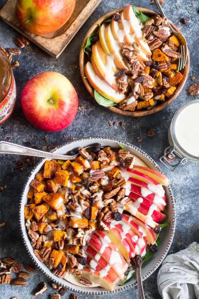 This sweet and savory roasted butternut salad is loaded with goodies! Perfectly caramelized butternut squash tossed with crisp sweet apples, pecans and raisins with a creamy homemade dairy-free buttermilk dressing using @NaturesIntentv! Paleo, vegan, and Whole30 compliant, too. #AD #NaturesIntentVinegar