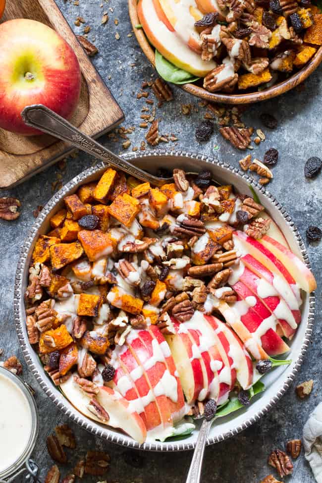 This sweet and savory roasted butternut salad is loaded with goodies! Perfectly caramelized butternut squash tossed with crisp sweet apples, pecans and raisins with a creamy homemade dairy-free buttermilk dressing using @NaturesIntentv! Paleo, vegan, and Whole30 compliant, too. #AD #NaturesIntentVinegar