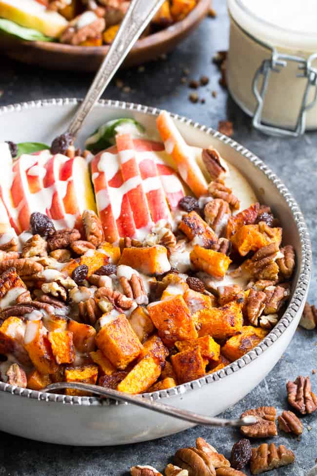 This sweet and savory roasted butternut salad is loaded with goodies! Perfectly caramelized butternut squash tossed with crisp sweet apples, pecans and raisins with a creamy homemade dairy-free buttermilk dressing using @NaturesIntentv! Paleo, vegan, and Whole30 compliant, too. #AD #NaturesIntentVinegar