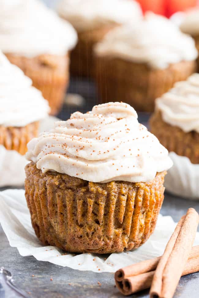 These Paleo Pumpkin Cupcakes are soft, moist, sweet, perfectly spiced, and topped with a dairy-free maple cinnamon "cream cheese" frosting!  These healthy grain free sweet treats are easy to make, great for kids and perfect for fall and winter.  