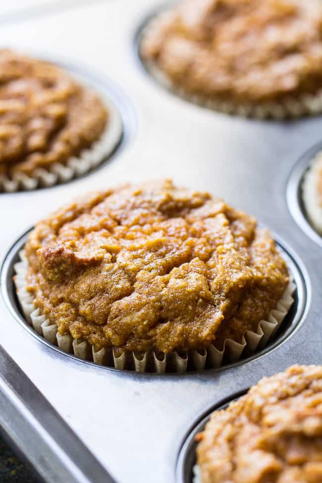 These Paleo Pumpkin Cupcakes are soft, moist, sweet, perfectly spiced, and topped with a dairy-free maple cinnamon "cream cheese" frosting!  These healthy grain free sweet treats are easy to make, great for kids and perfect for autumn.  