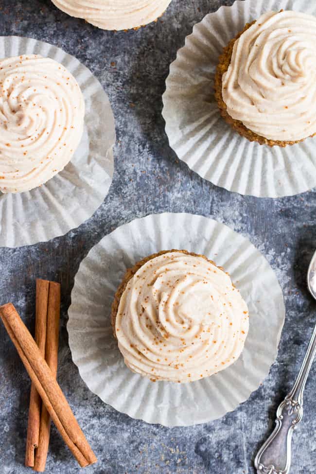 These Paleo Pumpkin Cupcakes are soft, moist, sweet, perfectly spiced, and topped with a dairy-free maple cinnamon "cream cheese" frosting!  These healthy grain free sweet treats are easy to make, great for kids and perfect for fall and winter.  