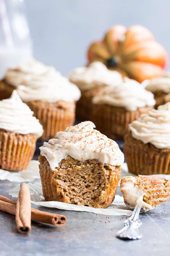 These Paleo Pumpkin Cupcakes are soft, moist, sweet, perfectly spiced, and topped with a dairy-free maple cinnamon "cream cheese" frosting!  These healthy grain free sweet treats are easy to make, great for kids and perfect for fall and winter.  