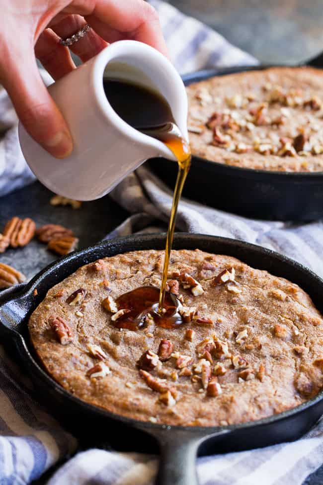 This healthy paleo and vegan banana breakfast bake is loaded with maple flavor, cinnamon and hearty pecans for a sweet satisfying breakfast treat.  Gluten free, dairy free, egg free, refined sugar free, oil free and kid approved!