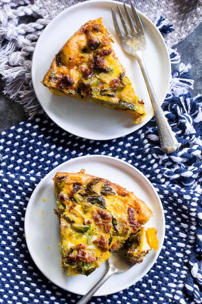 This paleo quiche has an easy butternut squash crust and is packed with sausage, veggies and tons of flavor.  It's Whole30 compliant and perfect for brunch or any meal.  Great as a make-ahead breakfast, too!