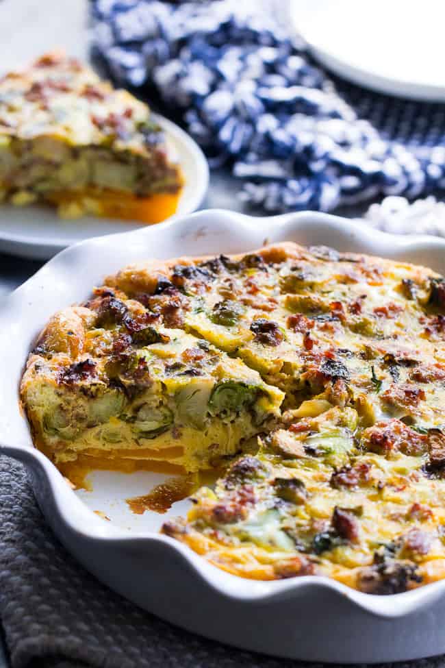 This paleo quiche has an easy butternut squash crust and is packed with sausage, veggies and tons of flavor.  It's Whole30 compliant and perfect for brunch or any meal.  Great as a make-ahead breakfast, too!