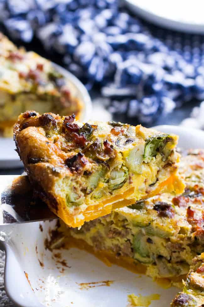 This paleo quiche has an easy butternut squash crust and is packed with sausage, veggies and tons of flavor.  It's Whole30 compliant and perfect for brunch or any meal.  Great as a make-ahead breakfast, too!