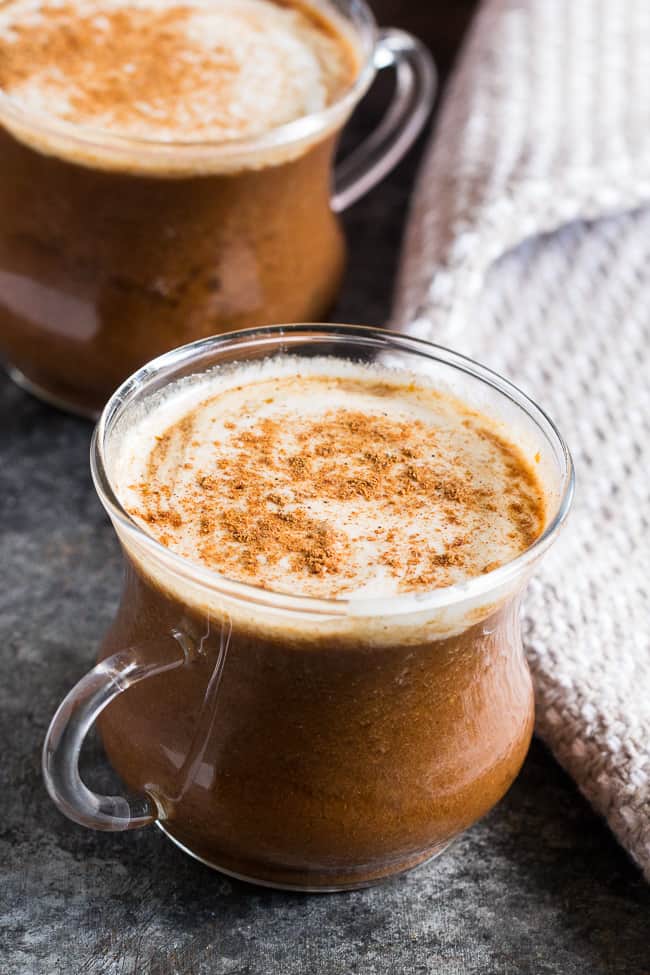 This easy homemade paleo pumpkin spice latte is dairy-free and naturally sweetened with medjool dates.  Add collagen protein for a healthy boost to this cozy and festive latte! #AD #axecollagen @drjoshaxe