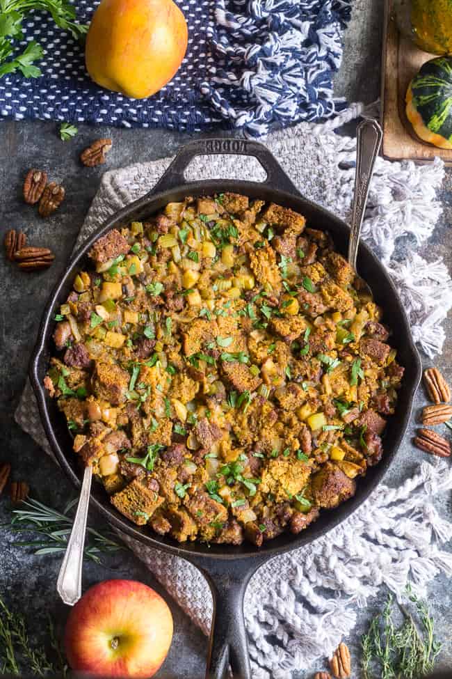 This savory and sweet "cornbread" Paleo Thanksgiving Stuffing is for all of you who want to keep with clean but still crave some bread in your stuffing!  A grain-free, dairy-free sweet potato bread is cubed and baked with sausage, apples, celery and onion, mushrooms, pecans and herbs for a delicious, filling and healthy Thanksgiving stuffing reminiscent of the classic.