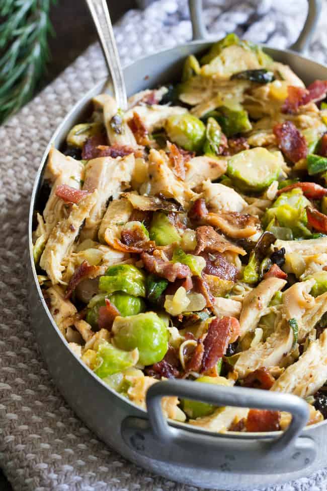 Roasted chicken and brussels sprouts are tossed with crispy bacon and baked in a creamy dairy free sauce for a super comforting, delicious and filling Whole30, paleo, and low carb meal. 