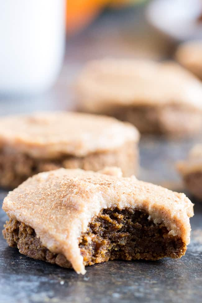 These Paleo Pumpkin Spice Latte Cookies have lots of sweet spice and are topped with a maple cinnamon cashew "cream cheese" frosting! Soft and chewy, gluten-free, dairy-free, vegan option