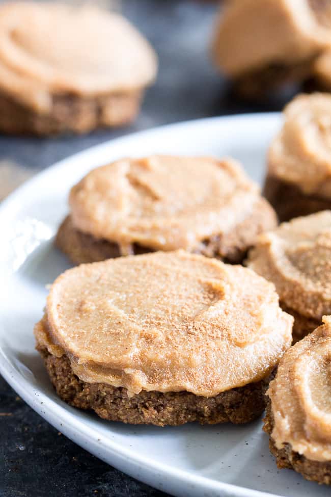 These Paleo Pumpkin Spice Latte Cookies have lots of sweet spice and are topped with a maple cinnamon cashew "cream cheese" frosting! Soft and chewy, gluten-free, dairy-free, vegan option