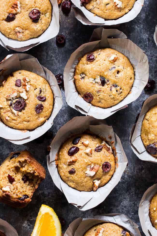 These soft, moist, and flavorful paleo cranberry orange muffins are studded with pecans and spiced just right! Great for the holidays or year round, these muffins are kid approved, gluten free, dairy free, and refined sugar free.