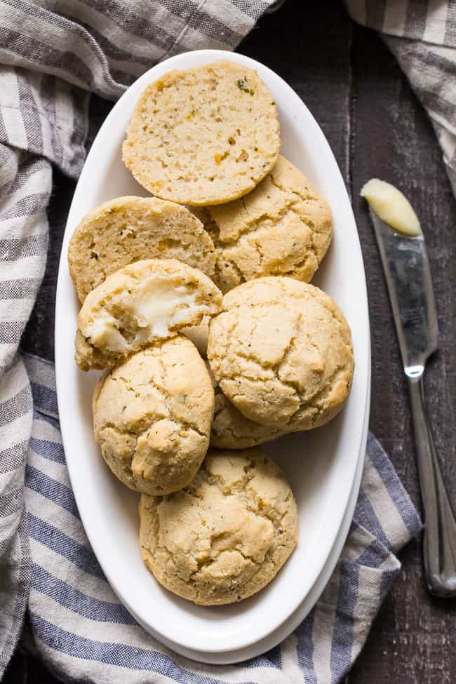 These Garlic Herb Paleo Dinner Rolls come together in one bowl and couldn’t be easier to make. Crisp on the outside, soft and doughy inside, they’re irresistible and family approved! Grain free and dairy free.