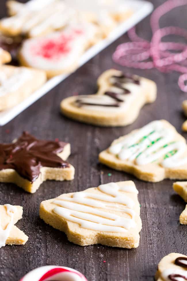 These easy cut-out Paleo Sugar Cookies are made with almond and coconut flour and sweetened with honey.  The perfect sugar cookies for the holidays that no one will guess are Paleo.  Grain free, refined sugar free, kid approved!