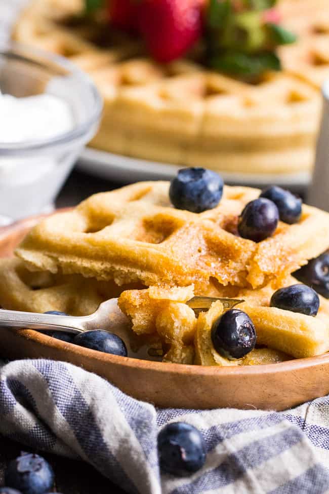 These classic paleo waffles are crisp on the outside, soft and fluffy on the inside, freezable, and family approved!  Gluten free, grain free, dairy free, refined sugar free, and easy to make.