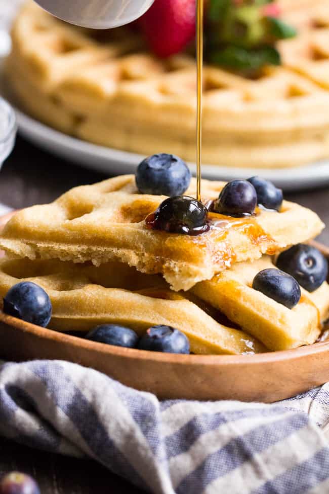 These classic paleo waffles are crisp on the outside, soft and fluffy on the inside, freezable, and family approved!  Gluten free, grain free, dairy free, refined sugar free, and easy to make.