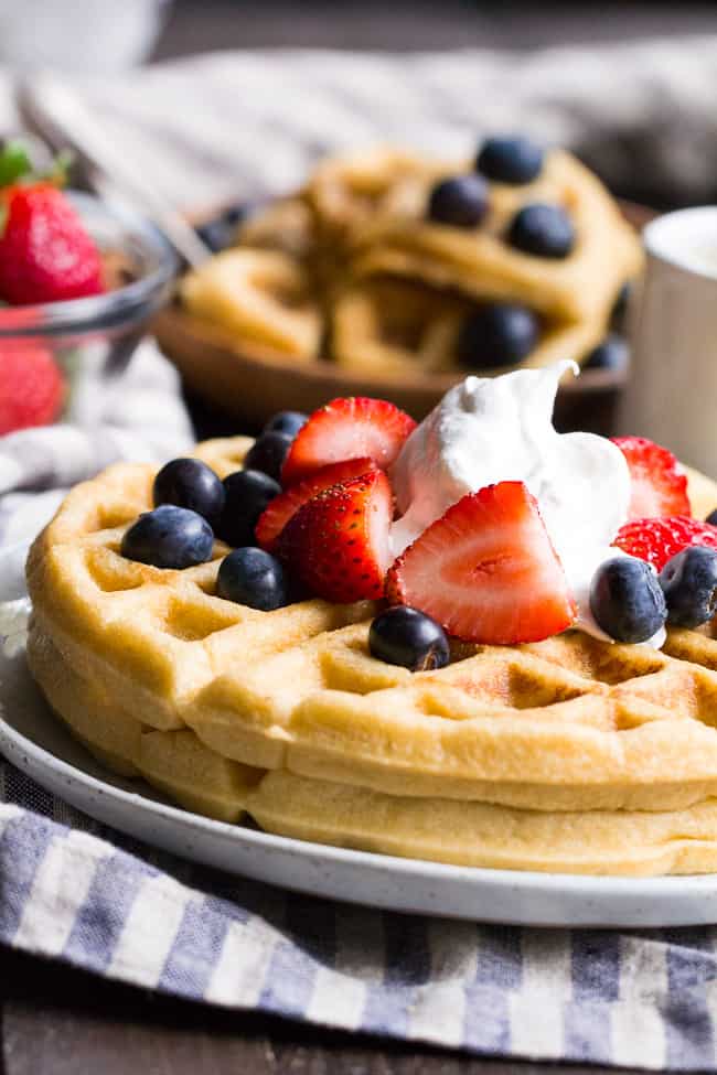 These classic paleo waffles are crisp on the outside, soft and fluffy on the inside, freezable, and family approved!  Gluten free, grain free, dairy free, refined sugar free, and easy to make.