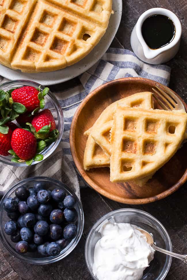 These classic paleo waffles are crisp on the outside, soft and fluffy on the inside, freezable, and family approved!  Gluten free, grain free, dairy free, refined sugar free, and easy to make.