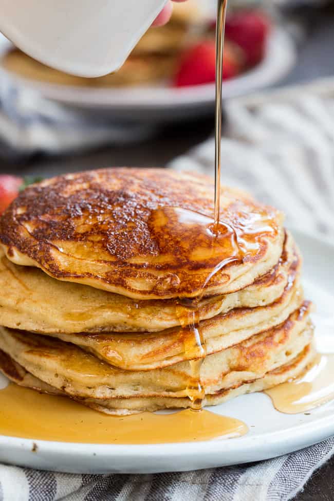 These fluffy paleo buttermilk pancakes are the perfect healthy answer to your pancake cravings! They come together quickly and are a hit with kids and adults alike. Grain free, nut free, dairy free and even freezable, which makes them great for breakfast or brunch any day of the week!