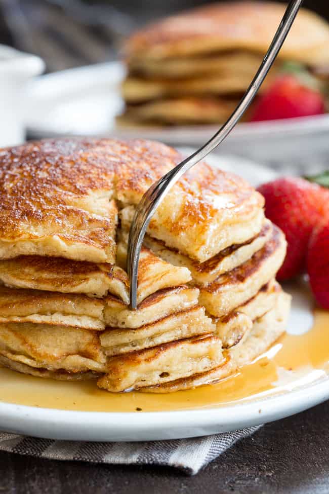 These fluffy paleo buttermilk pancakes are the perfect healthy answer to your pancake cravings! They come together quickly and are a hit with kids and adults alike. Grain free, nut free, dairy free and even freezable, which makes them great for breakfast or brunch any day of the week!