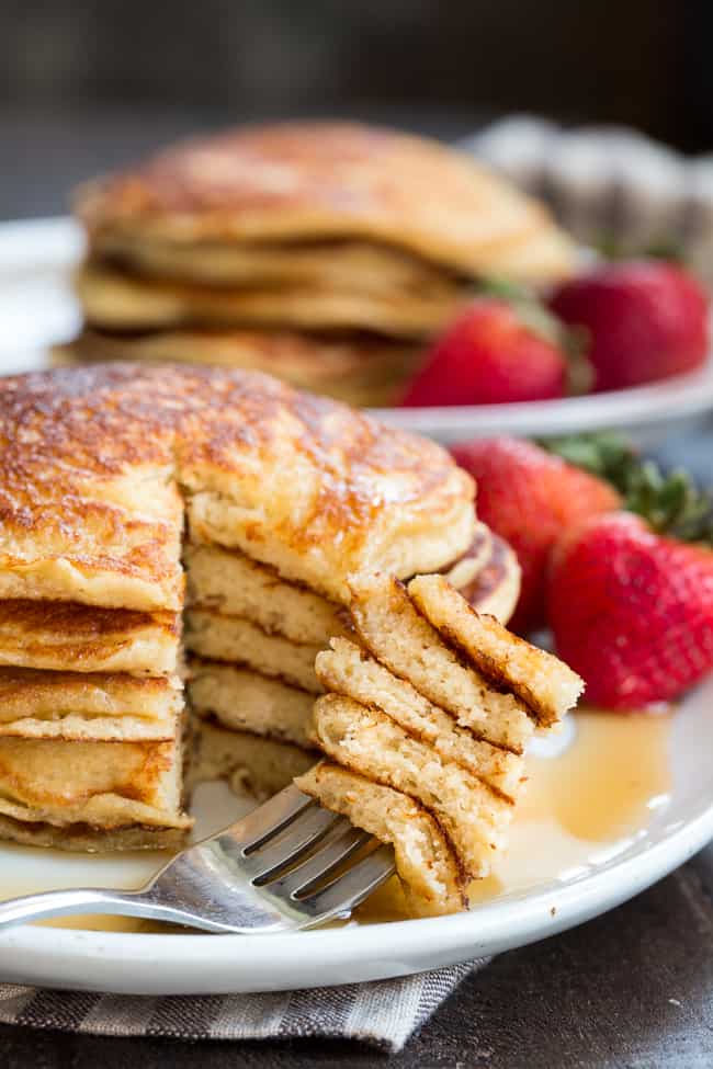 These fluffy paleo buttermilk pancakes are the perfect healthy answer to your pancake cravings! They come together quickly and are a hit with kids and adults alike. Grain free, nut free, dairy free and even freezable, which makes them great for breakfast or brunch any day of the week!