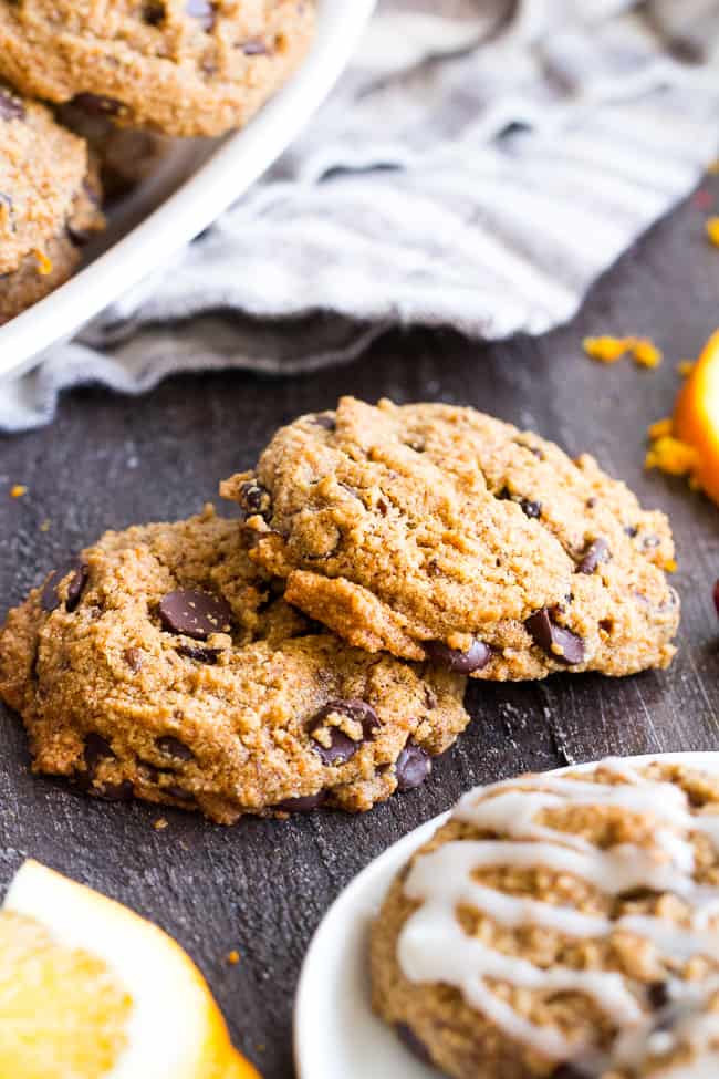 These cranberry orange chewy chocolate chip cookies might just become your favorite cookies, ever!  They're grain free yet have a thick and chewy "oatmeal" texture, and are also egg free, dairy free, paleo and vegan.  Super kid friendly and perfect for the holidays or anytime!