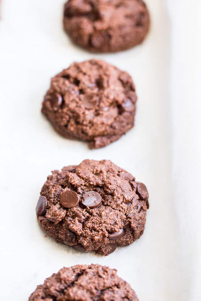 These thick and chewy double chocolate chip cookies are easy to make, packed with chocolate and made with real-food ingredients.  They're dairy-free, gluten-free, paleo, vegan, egg free and family approved!  
