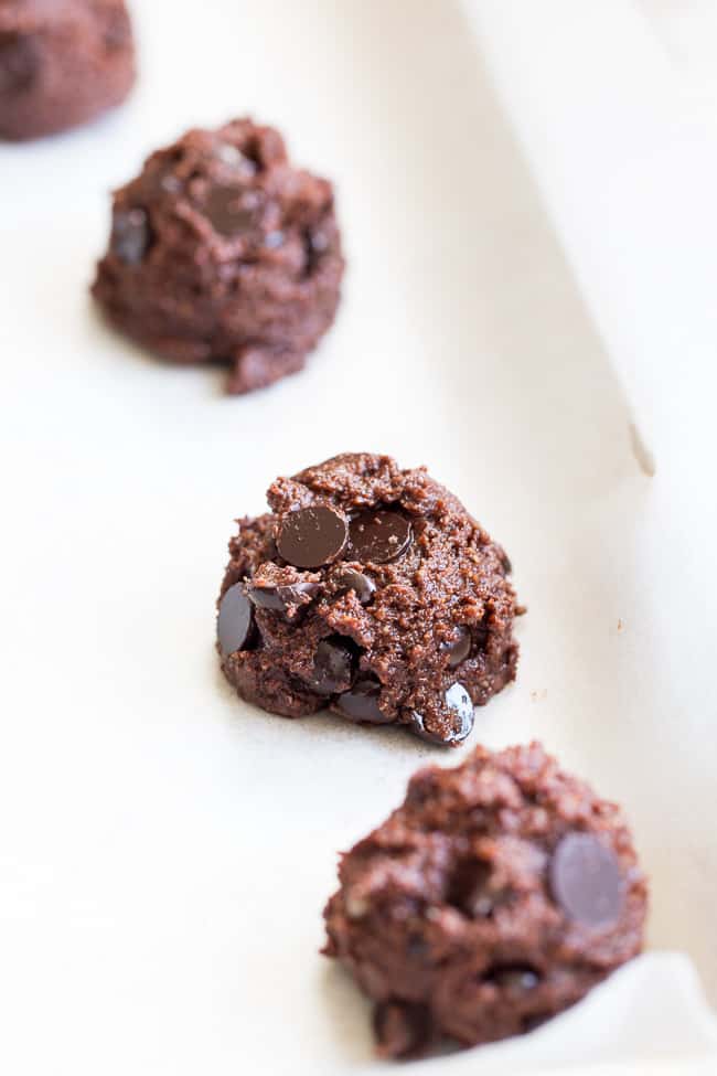 These thick and chewy double chocolate chip cookies are easy to make, packed with chocolate and made with real-food ingredients.  They're dairy-free, gluten-free, paleo, vegan, egg free and family approved!  