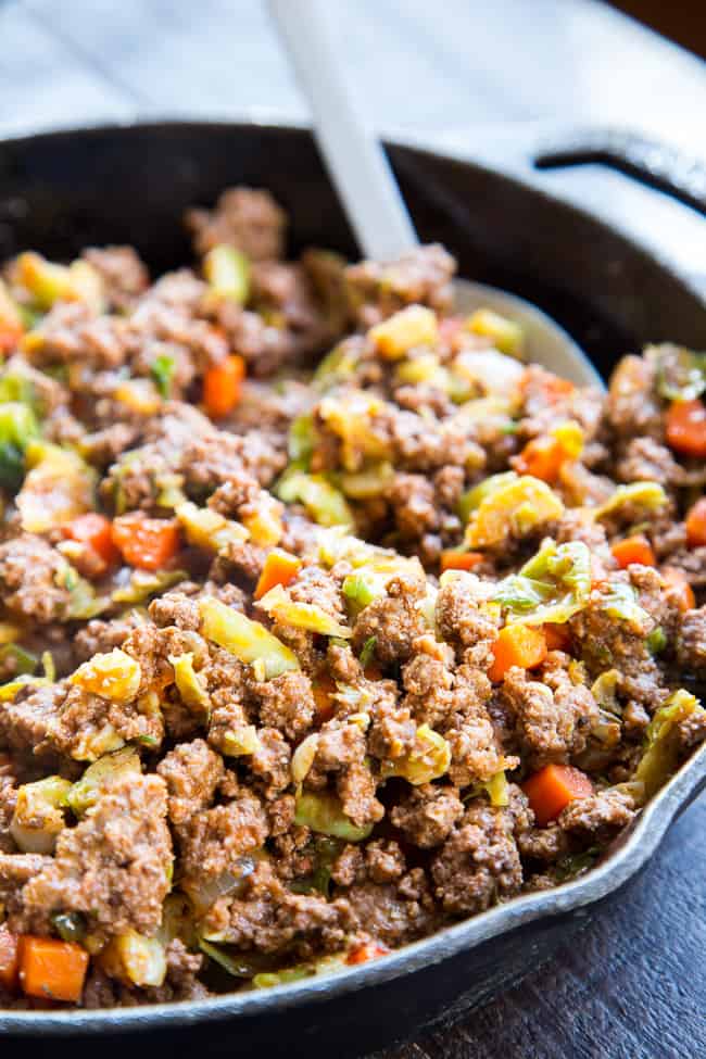 This Shepherd's Pie is classic, cozy comfort food for cold winter days!  It's paleo and Whole30 compliant, dairy free and kid approved.  A flavorful, hearty ground beef mixture is topped with creamy dairy-free mashed potatoes, and baked until golden brown and bubbling.  