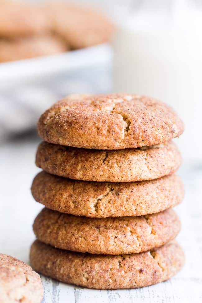 These super chewy, thick and soft paleo and vegan snickerdoodles are deliciously addicting, kid approved, and great for holiday cookie season or anytime a craving hits!  Dairy free, egg free, grain free, gluten free, paleo and vegan. 