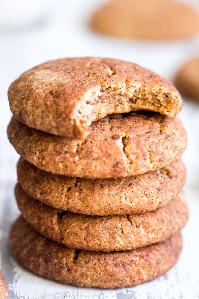 These super chewy, thick and soft paleo and vegan snickerdoodles are deliciously addicting, kid approved, and great for holiday cookie season or anytime a craving hits!  Dairy free, egg free, grain free, gluten free, paleo and vegan. 