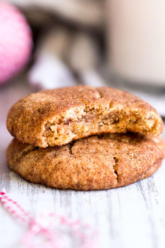 These super chewy, thick and soft paleo and vegan snickerdoodles are deliciously addicting, kid approved, and great for holiday cookie season or anytime a craving hits!  Dairy free, egg free, grain free, gluten free, paleo and vegan. 