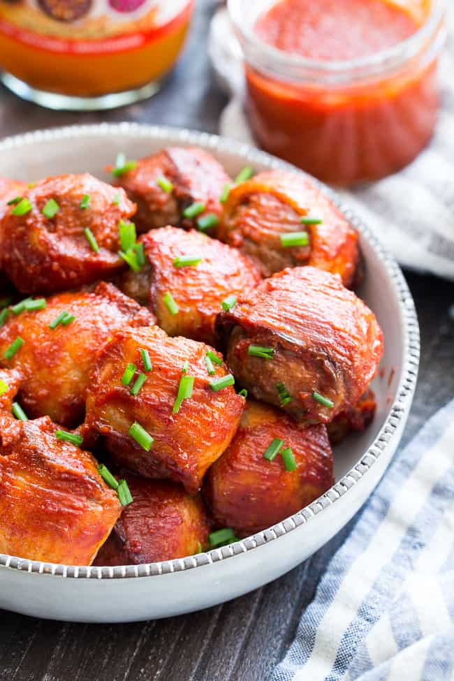 Tangy, smoky BBQ sauce and crispy bacon make these meatballs the tastiest you’ll ever eat! Kid approved and made with good-for-you ingredients, these BBQ bacon wrapped meatballs are paleo, Whole30 compliant, and downright addicting!