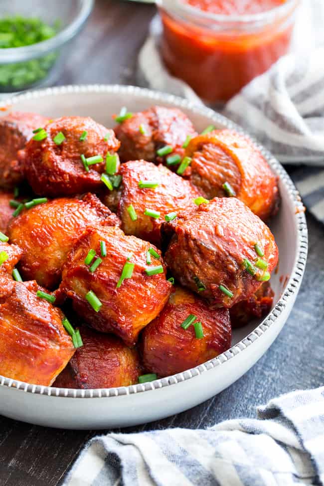 Tangy, smoky BBQ sauce and crispy bacon make these meatballs the tastiest you’ll ever eat! Kid approved and made with good-for-you ingredients, these BBQ bacon wrapped meatballs are paleo, Whole30 compliant, and downright addicting!