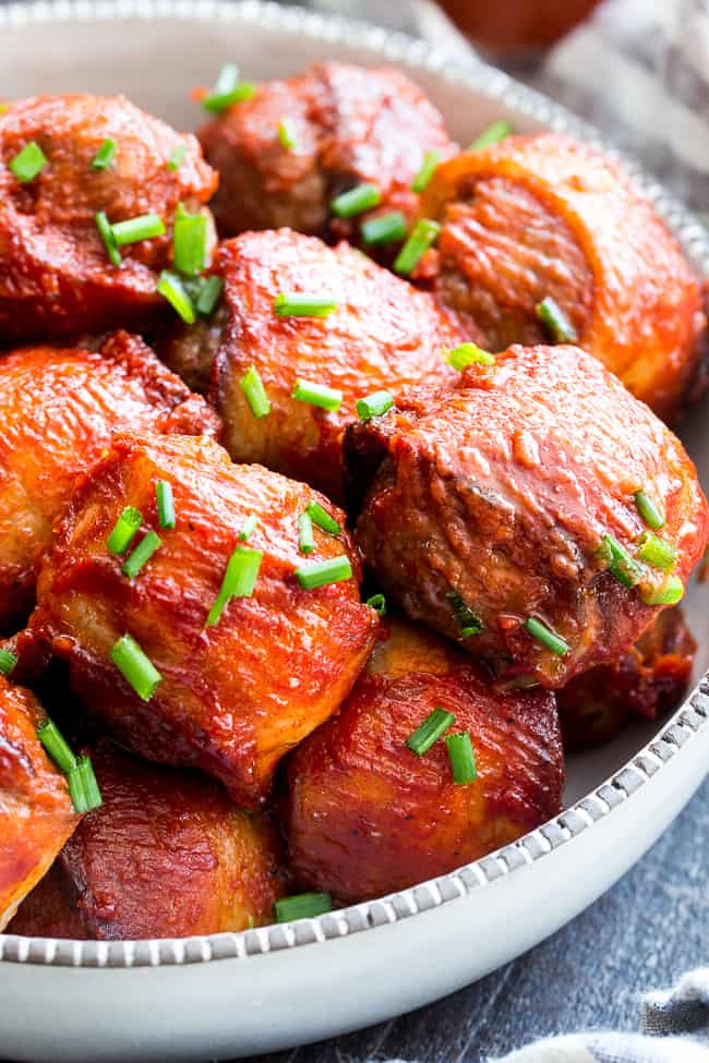 Tangy, smoky BBQ sauce and crispy bacon make these meatballs the tastiest you’ll ever eat! Kid approved and made with good-for-you ingredients, these BBQ bacon wrapped meatballs are paleo, Whole30 compliant, and downright addicting!