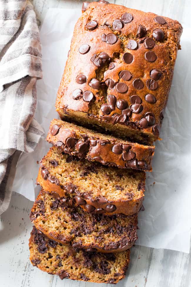 This Paleo chocolate chip banana bread is made with almond butter and almond flour, hearty and delicious with the perfect amount of sweetness.  Gluten-free, dairy-free, grain free, family approved, and great for breakfast or dessert! 