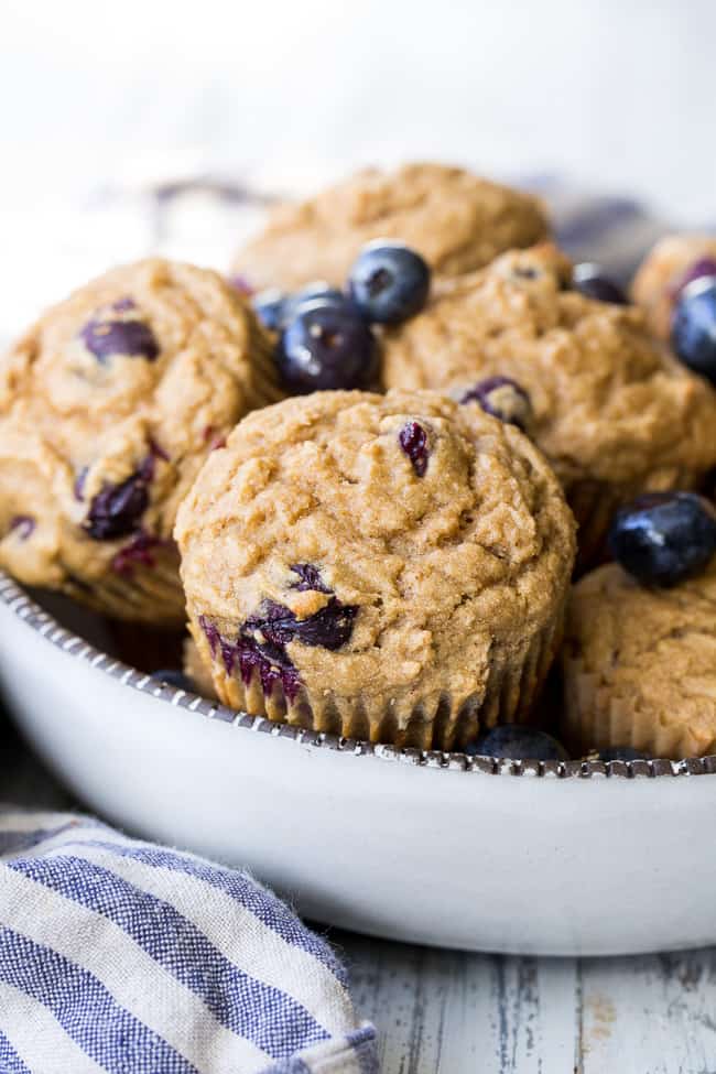 These classic blueberry muffins have a hearty and moist texture thanks to cassava flour and are bursting with flavor and juicy blueberries!  They're grain free, nut free, dairy free and paleo, family approved, and great for breakfasts and snacks!