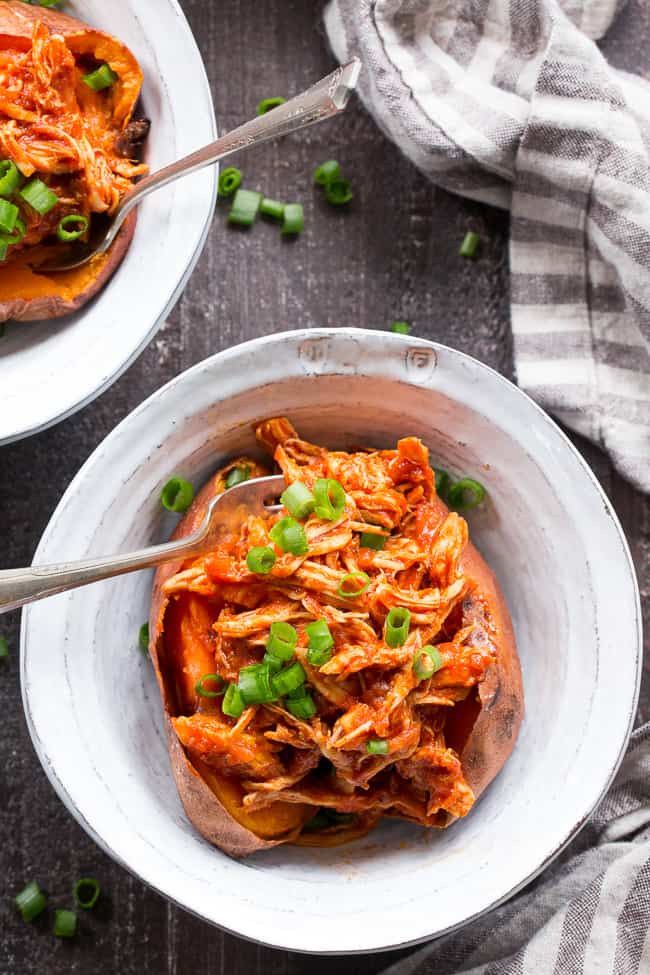 This simple Paleo and Whole30 Instant Pot BBQ Chicken is packed with flavor and perfect over a sweet potato or your favorite greens!  An easy homemade BBQ sauce is cooked right in with the chicken for a meal that's ready in 20 minutes - perfect for weeknights and family approved!