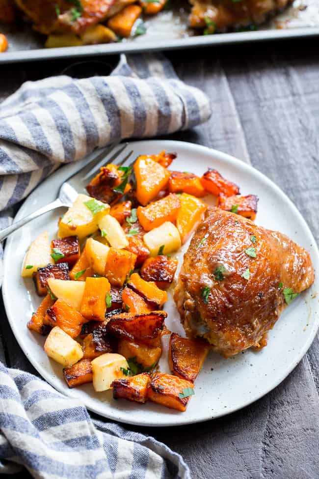 This savory and sweet glazed sheet pan chicken with butternut squash and apples is the perfect no-fuss, one-pan paleo and Whole30 dinner.  With a date-sweetened glaze, it's free of added sugar but packed with flavor and kid approved!