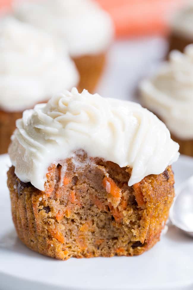 These dreamy carrot cake cupcakes are made with coconut and tapioca flour and sweetened with maple syrup, making them both paleo and nut free.   They're topped with a sweet creamy paleo vanilla "buttercream" that tastes just like real thing! 