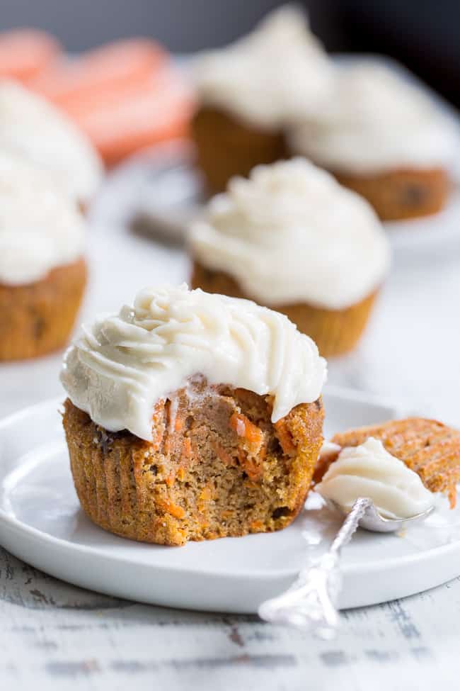 These dreamy carrot cake cupcakes are made with coconut and tapioca flour and sweetened with maple syrup, making them both paleo and nut free.   They're topped with a sweet creamy paleo vanilla "buttercream" that tastes just like real thing! 