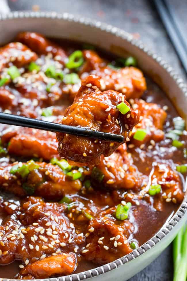 This paleo General Tso's Chicken is made in the Instant Pot in under 30 minutes!  Way better than takeout and just as fast, too, it's gluten-free, grain free, and free of refined sugar and soy.  Spicy and sweet, it's great served over cauliflower rice or with your favorite stir fried veggies!