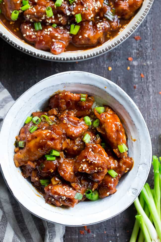 This paleo General Tso's Chicken is made in the Instant Pot in under 30 minutes!  Way better than takeout and just as fast, too, it's gluten-free, grain free, and free of refined sugar and soy.  Spicy and sweet, it's great served over cauliflower rice or with your favorite stir fried veggies!