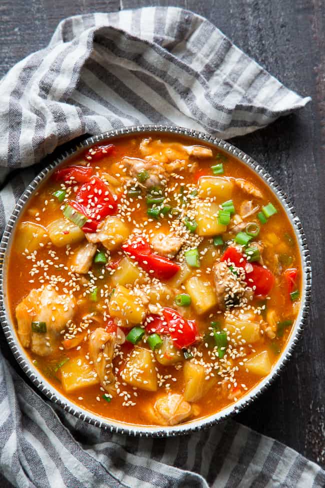 This Paleo and Whole30 Sweet and Sour Chicken is made in the Instant Pot so it's fast, easy, and a great meal for weeknights!  Family (and kid!) approved, made with real-food ingredients and ready in 30 minutes.